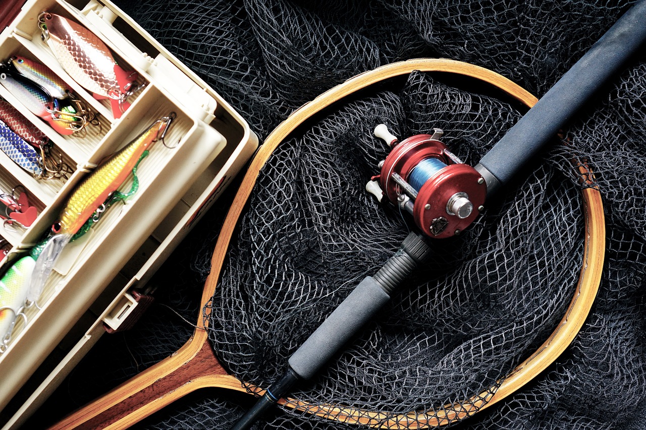 Angler tying a lure onto a fishing line